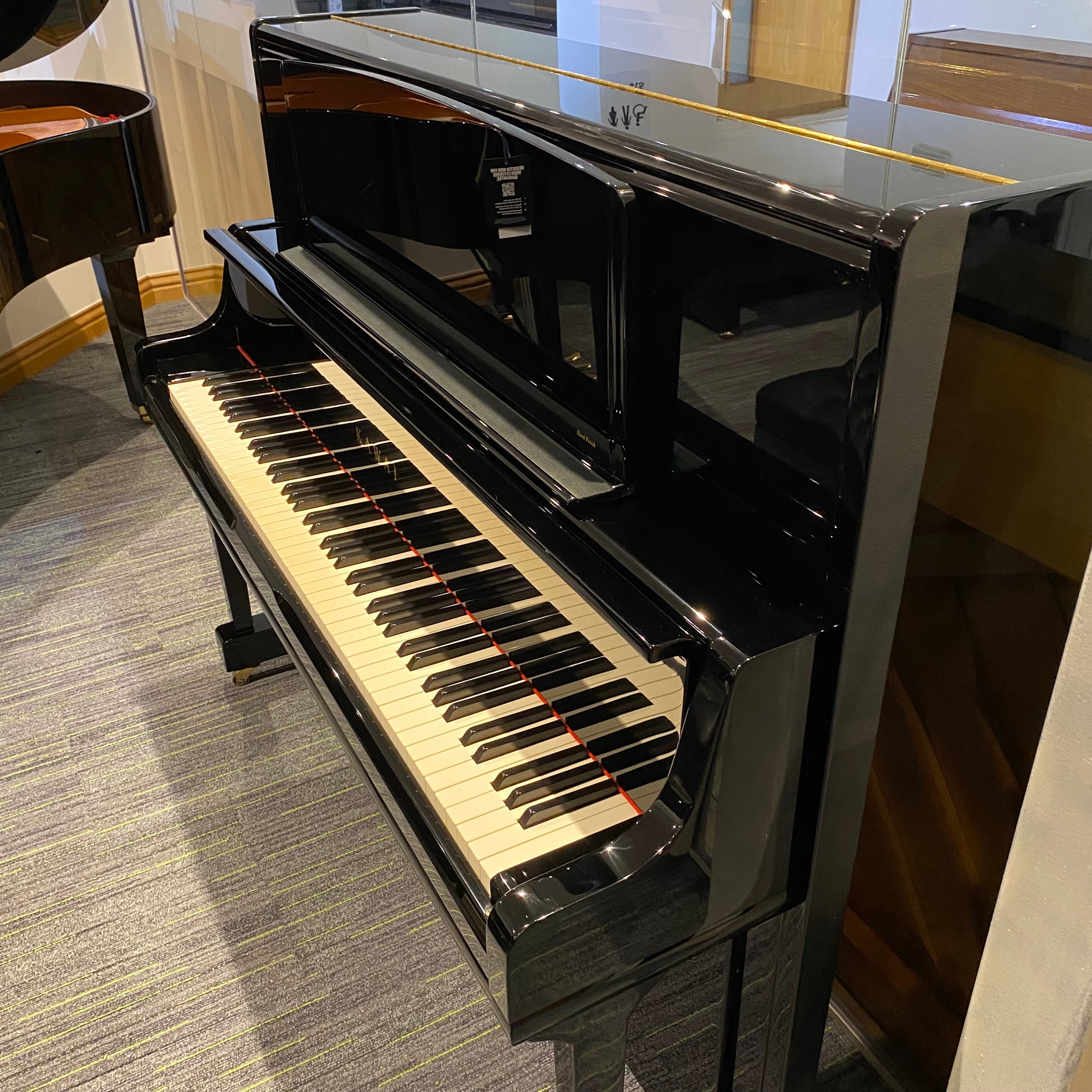 Pre owned Kawai K 7 upright piano in polished ebony Chamberlain Pianos